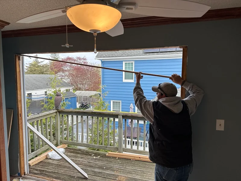 Window Solutions Plus protects the floors during this door installation